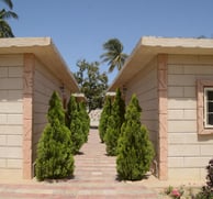 Een aantrekkelijke afbeelding van Apparthotel La Perle in Senegal, met moderne, comfortabele apparte