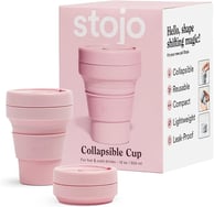 a pink collaps cup with a pink cupcake and a pink cupcake