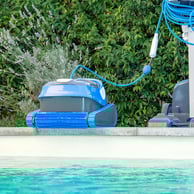a blue and white robotic automatic pool cleaner