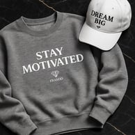 gray crewneck and hoodie and cap with motivational sentence