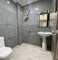 Designer Bathroom of 3 BHK Corner Builder Floor with Multiple Balconies — Chattarpur