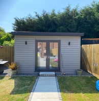 grey wooden garden room in malvern