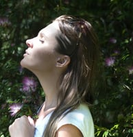 a woman with a white shirt and a white shirt respirating fresh air