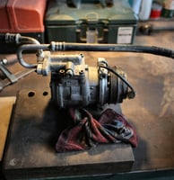 a carbuilder with a hose and a hose