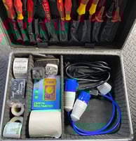 a tool kit with tools and equipment in a case