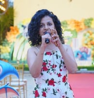 Woman holding a microphone