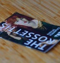 a book cover of a book with a woman's face and a bookmark