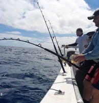 Anglers trolling on a catamaran - Catamaran Fishing Charters Seychelles