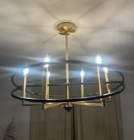 a chandelier with candles and candles
