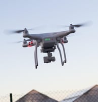 Drone flying in sky used in video surveillance. 