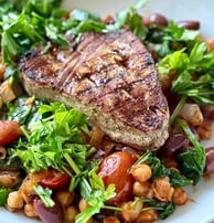 Semaglutide Recipe: Grilled Tuna Steak over Greens with Chickpeas and Tomatoes