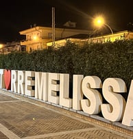 a sign that says i love you in the middle of the street