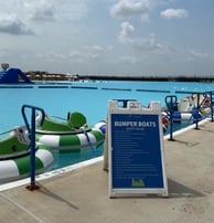 bumper boats in a lagoon pool