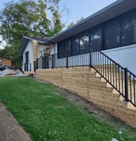 a house with a fenced deck nashville construction