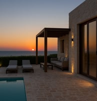 a patio with a pool and lounge chairs
