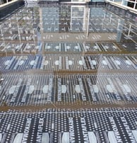 a metal structure with a lot of metal mesh