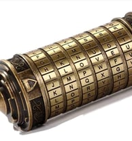 Metal Cryptex scroll puzzle with rotating letter rings and hidden compartment inside