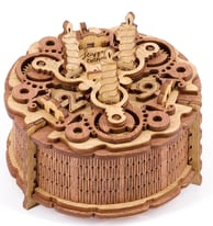 Escape room puzzle featuring a birthday cake with hidden clues or compartments in the frosting