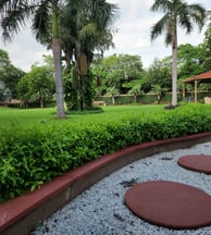 Entrance road leading to farm land in Manesar plots for sale near NH8