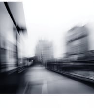 a black and white photo of a city street
