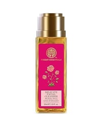 a bottle of body lotion with a pink rose on it