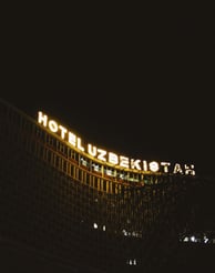 Hotel Uzbekistan Sign in Night