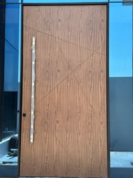 a wooden door with a wooden door and a window