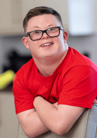 Smiling high school boy with downs