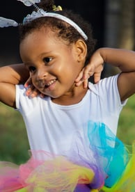 Adorable young ballerina outside