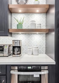 Bright kitchen design with durable quartz countertops and premium stainless steel appliances
