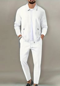 a man in a white suit and a white shirt