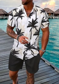 a man in a hawaiian shirt and shorts