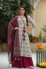 Palazzo pants paired with kurtas create a breezy, graceful ensemble. The flowy bottoms balance out b