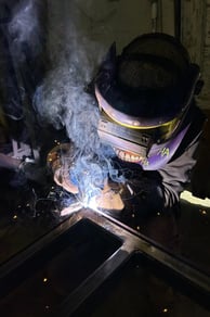 jaspar schirmer welding a steel beam