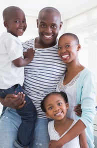 a black family with a school-aged son and daughter