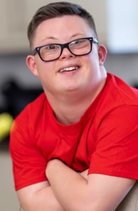 a handsome young man with downs