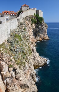 The Dubrovnik, Croatia coastline with a pic of the wall