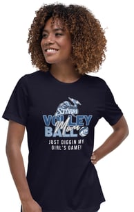 a woman wearing a t - shirt that says, "Volleyball Mom",