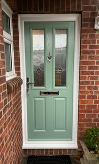 a new chartwell green l front door on red brick house installed by buildmydoor 