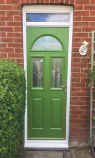 A bespoke green painted composite front door that fits a Victorian terrace house in Hampshire