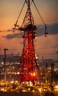 a red tower with a red tower in the background