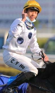 Photo of Hong Kong jockey Vincent Ho on racehorse Golden Sixty