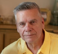 Spiritual biblical Metaphysical teacher Dr Roy e Richmond in a casual yellow shirt