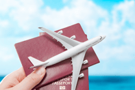 a person holding a passport and a passport case