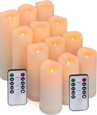 a group of candles with remote control and remote control