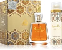 a bottle of perfume with a box of perfume