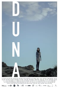 a woman standing on a hill with a blue sky in the background, dany campos, film, spain, Duna