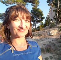 Alonga travel the author in Dubrovnik smiling happily about being there