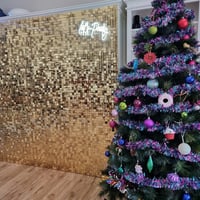 Gold shimmer wall with lets party neon behind xmas tree for work Christmas party in Brisbane.
