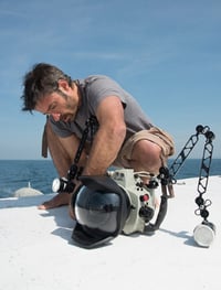 Nicolas Job preparing his underwater housing.